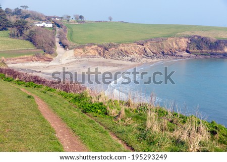 South West Coast Path view of Porthcurnick beach Cornwall England UK located north of Portscatho on the Roseland peninsula