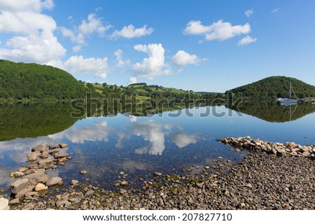Ullswater by Pooley Bridge Lake District Cumbria England UK blue sky on beautiful summer day with sunshine