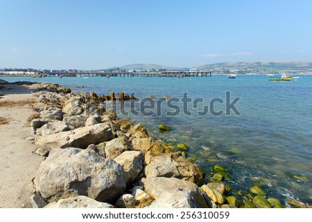 Swanage harbour and jetty Dorset England UK with blue sea and sky on a beautiful summer day on the English Jurassic coast