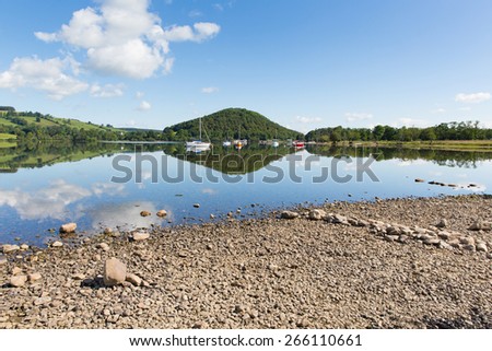 Calm peaceful relaxed morning on a still day at a beautiful lake with cloud reflections
