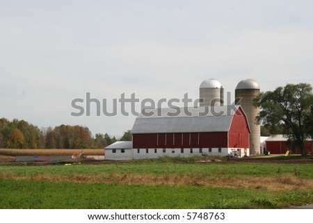 red Wisconsin dairy barn in fall