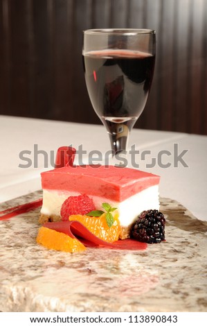 raspberry sorbet served on granite with port wine/ raspberry sorbet