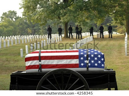 a caisson awaits burial at Arlington Cemetery