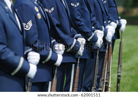 color guard squad with white gloves and rifles