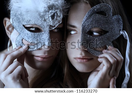 Two woman with half broken mask/Mask ball