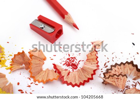 Tools for painting: color shavings, sharpener and red pencil