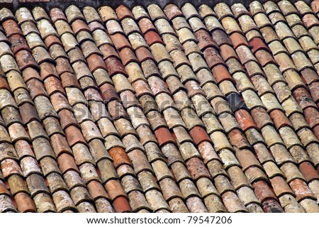 Old clay tile roof in Taormina, Sicily, Italy