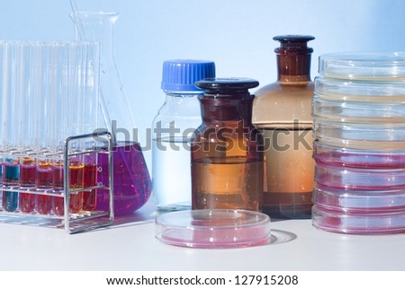 culture dish and other glass laboratory apparatus in desk