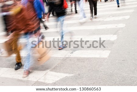 Busy city street people on zebra crossing