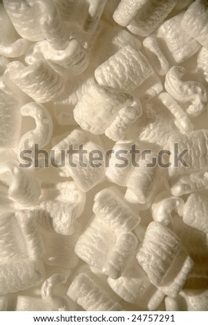 several white styrofoam packing peanuts close up shot