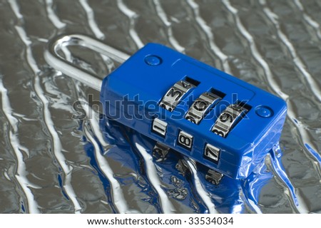 blue lock with numbers 187 - a numeric code for the crime of murder, silver background