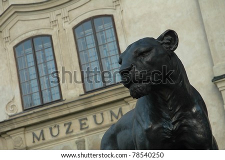 black lion sculpture in front of Humenne museum (slovak: muzeum), Slovakia