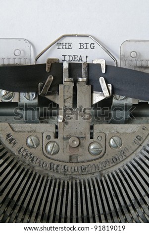 text \'THE BIG IDEA\' written in an old typewriter, vertical composition