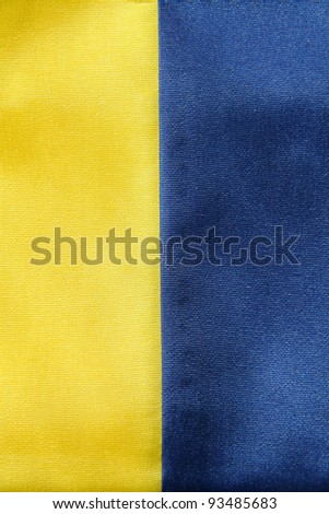 textile ribbon in yellow and blue colors, background photo.