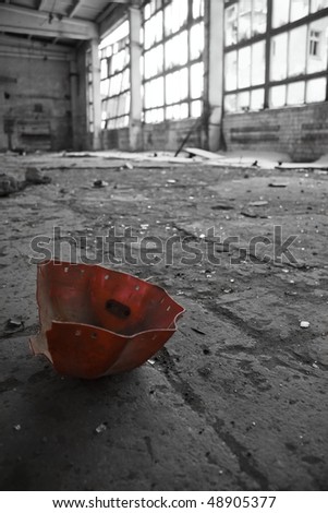 Abandoned Industrial interior with red object