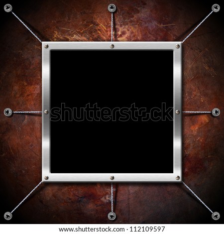 Metal Frame on a Copper Grunge Wall Empty metallic frame on a grunge brown background