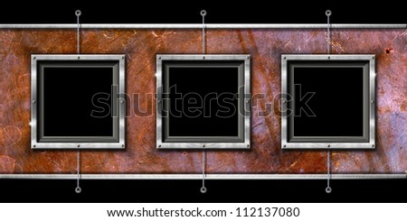 Three Metal Frames on a Grunge Wall Horizontal and grunge background with three metallic frames