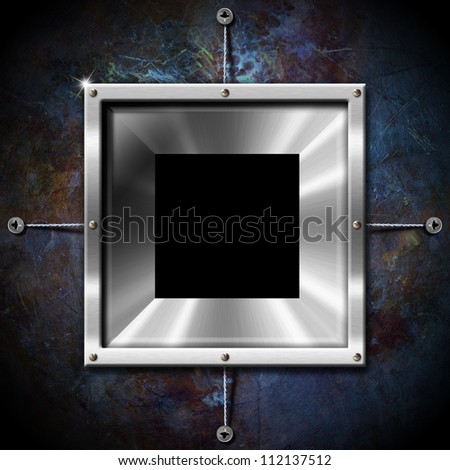 Metal Frame on a Grunge Wall Empty metallic frame on a grunge blue background