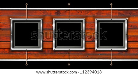 Three Metal Frames on a Wooden Wall / Horizontal and wooden background with three metallic frames