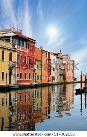 Chioggia Venezia (Venice) - Italy / Chioggia Venice, typical houses along the canal with reflections