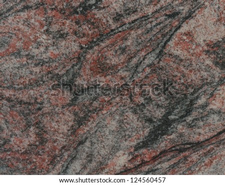 Acapulco Granite (Brazil) / Surface of the granite with black, red and brown tint for background