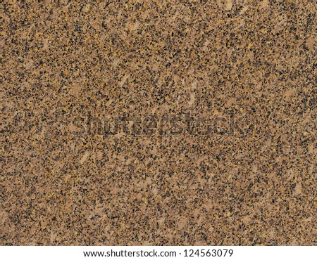 Antique Yellow Granite (Brazil) / Surface of the granite with yellow, brown and black tint for background