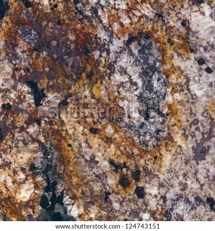 Delirium Granite / Surface of the granite with white, brown, yellow and black tint for background