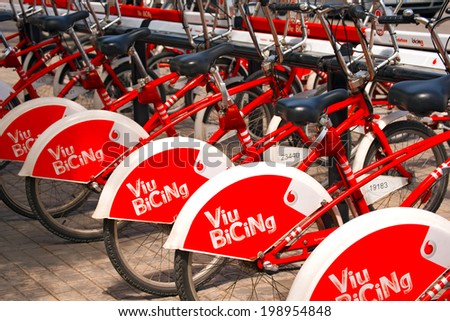 BARCELONA, SPAIN - JUN 10, 2014: Bicycle of the Bicing service in Barcelona sponsored by Vodafone. With the bicing sharing service people can rent bicycles for short trips.