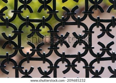 Black Wrought Iron Fence / Silhouette of an old wrought iron fence painted with black color