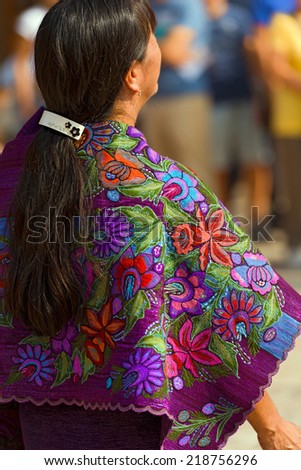 Mexican Dress - Zinacantan Chiapas Mexico / Mexican woman with multicolored dress with floral texture - Zinacantan Chiapas Mexico
