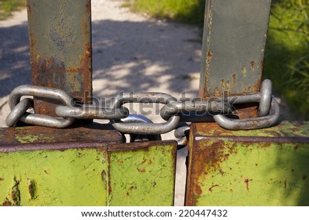 Gate Closed by Chain / Old rusty gate closed by a big steel chain