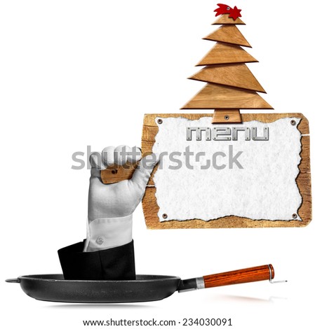 Christmas Restaurant Menu / Hand come out from a pan and holding a wooden cutting board with sheet of white paper and wooden Christmas tree with red comet. Template for a Christmas food menu