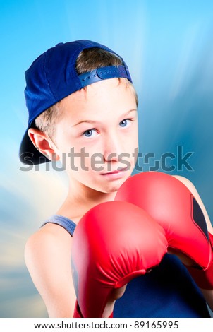 child with boxing gloves fights for a best future