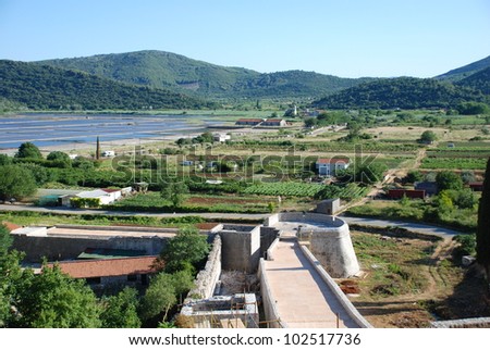 View at the Ston town, European wall of China, Mediterranean bay, and salt pans on the peninsula of Peljesac, Dalmatia, Croatia