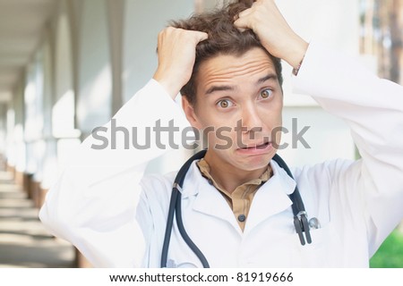Photo of a crazy doctor with a copy space
