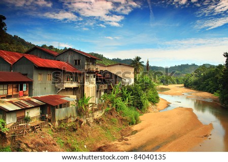 River landscape with traditional buildings