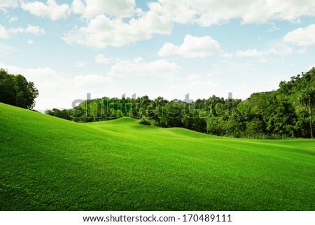 Panoramic View Of Nice Green Hill On Blue Sky Background