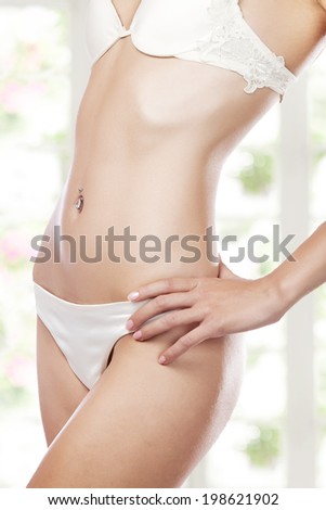 View of nice womanÃ¢Â?Â?s  body on color  background
