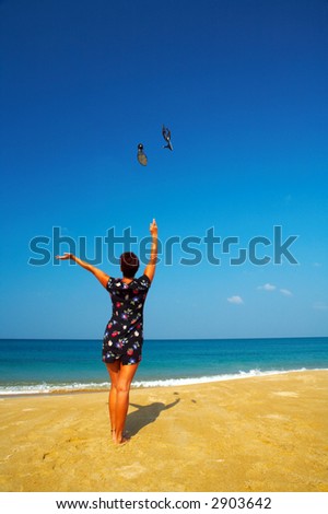 view of a women throwing away her shoes