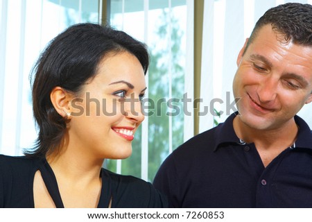 view of work couple  interacting in a natural work environment