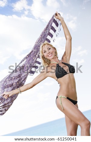 Portrait of beautiful girl having good time on tropical beach