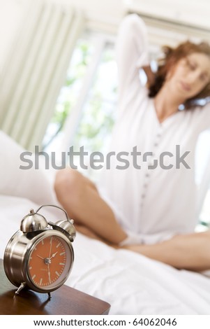 close up view of alarm-clock in morning bedroom environment