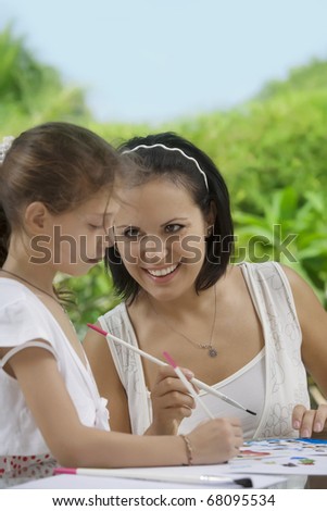 portrait of happy mother with daughter  having good time in domestic  environment