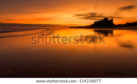Bamburgh Castle is an imposing castle located on the coast at Bamburgh in Northumberland, England. It is a Grade I listed building.