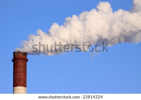 Power plant pollution on blue sky background