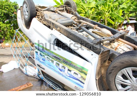 PHETCHABUN, THAILAND - NOVEMBER 24 : Car accident on the road with turned upside-down after road collision november 24,2012 in phetchabun thailand.