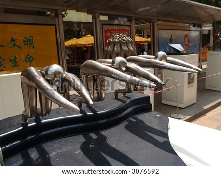 2008 Beijing summer Olympic game national artistic city sculpture competition finalists displayed for public voting in the major shopping district Wang-Fu-Jing in Beijing July 2006.