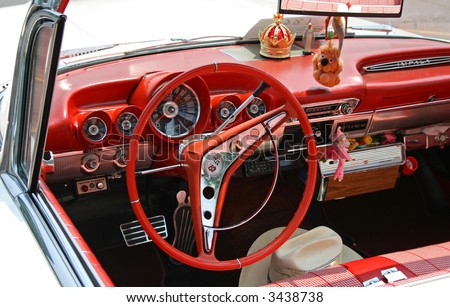 A classic car displayed at a antique car show - Steering Wheel details