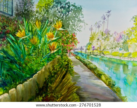 Sunny bird of paradise flowers overlook a canal in a watercolor painting.