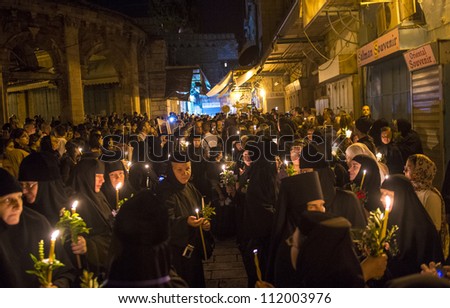 JERUSALEM - AUGUST 25 : Unidentified nuns take part in a candle procession as part of the feast of the Assumption of the Virgin Mary on August 25 2012 in old Jerusalem Israel